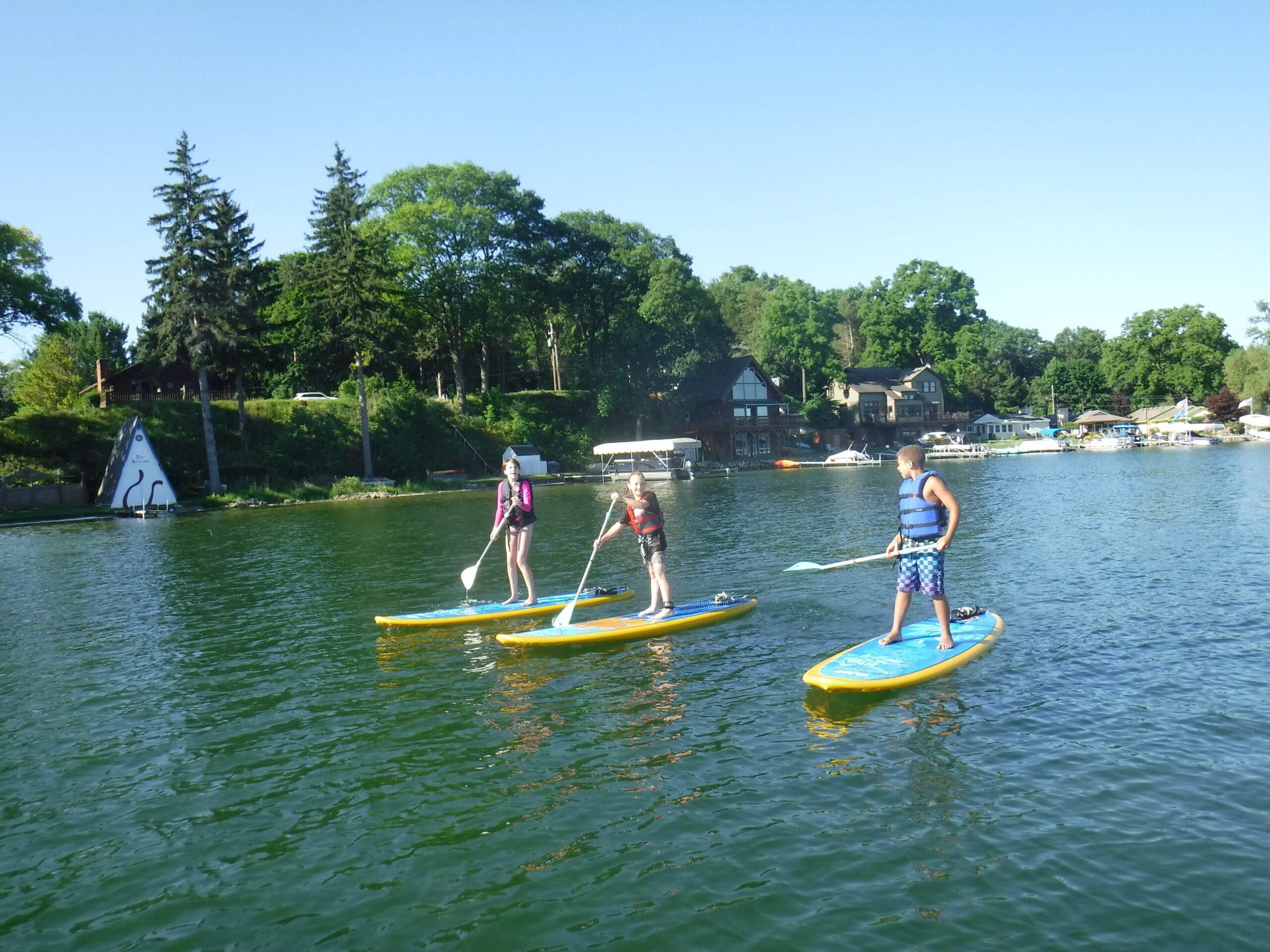 Match Made in Heaven: Stand-up Paddle Boarding + Yoga = SUP Yoga